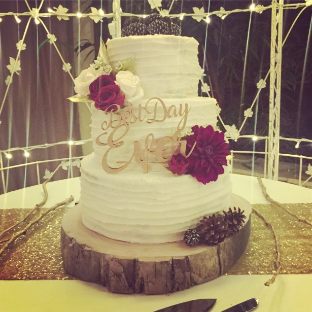 "Best Day Ever" Buttercream Striped Wedding Cake with Flowers and Pinecones