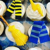 Hufflepuff scarf, lightening bolt, broomstick and Ravenclaw scarf